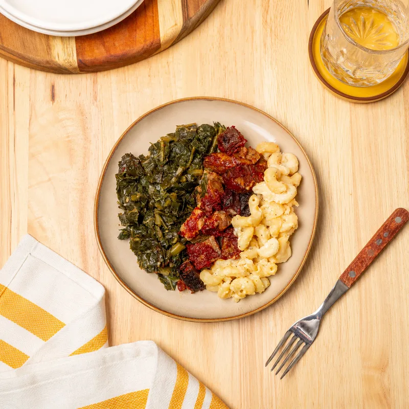 BBQ Brisket Burnt Ends with cheddar mac and braised greens